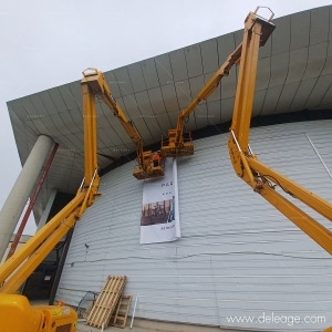 Installation bâche avec 2 nacelles — La pose idéale d'une BACHE sur FACADE COURBE