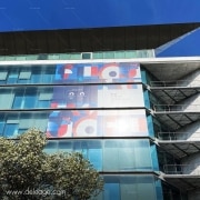 Microperfore sur facade — Habillage aux couleurs des JO PARIS 2024 sur la façade de la DGAC