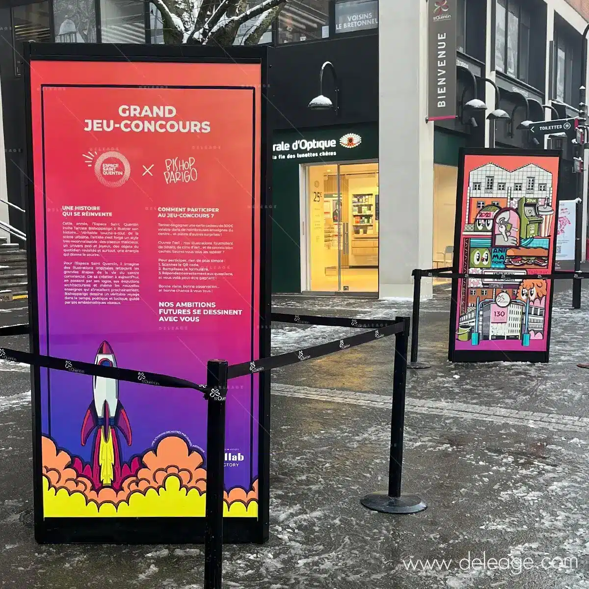 location-totem-evenementiel-exterieur-concours Totem d'exposition extérieur avec visuel coloré de fusée pour un jeu concours.